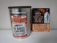 A metal advertising sign 'New Haskel Rubber Core Golf Balls' together with a lidded container with