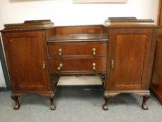 An early twentieth century sunk centered sideboard,