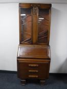 An oak bureau bookcase