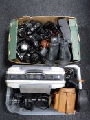 Two boxes containing assorted photographic equipment and cameras