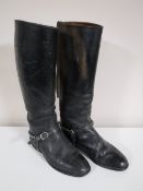 A pair of leather riding boots
