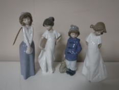 Four Nao figures of girls, including dancer,