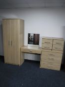 A contemporary five piece bedroom suite : wardrobe, dressing table,