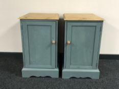 A pair of reclaimed pine painted cupboards