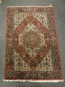 A Tabriz design rug,