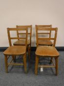 Four mid 20th century school chairs