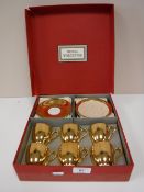 A boxed Royal Worcester twelve piece golden silver lustre tea set