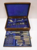 An early twentieth century oak canteen containing Sheffield plate cutlery