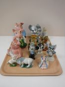 A tray of three Wade Nat West pigs and nine other assorted Wade figures including Bill & Ben,