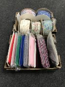 Two boxes of assorted fabric trim and two boxes of greetings cards