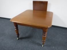 A Victorian mahogany pull out table with leaf