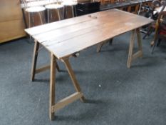 A pine topped trestle table