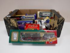 A box containing boxed die cast vehicles, including Corgi classics,