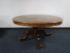 A Victorian burr walnut oval breakfast table CONDITION REPORT: Minor surface wear
