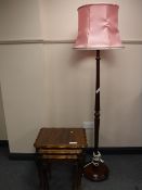 A nest of three inlaid mahogany table and a mahogany standard lamp with shade