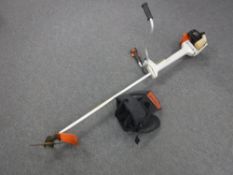A Stihl FS 450 petrol strimmer with harness