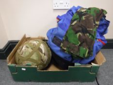 A back pack containing British Army uniform and two helmets