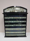 An early 20th century Mitchell's Cigarettes cigarette counter top display cabinet
