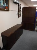 A Danish mahogany secretaire cabinet with triple door sideboard