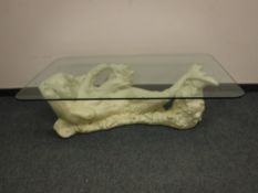 An ornate mermaid coffee table,