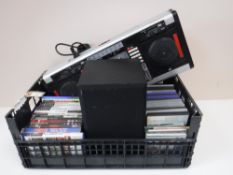 A DJ mixing deck, DVDs,