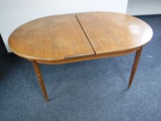 A 1970's oval teak G plan dining table