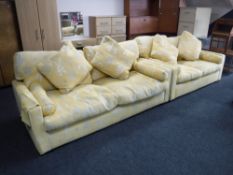 A contemporary three seater and two seater settee in a yellow Oriental print
