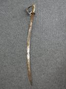An Indian sword with brass handle