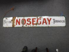 An early 20th century Faulkner Tobacco Nosegay advertising sign