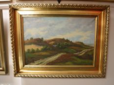 A gilt framed continental school oil on canvas - cottage in a rural landscape,