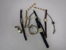 A collection of ladies and gents wristwatches