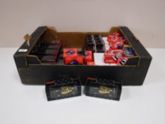 A box containing boxed Corgi and collectors edition sports cars and police vehicles