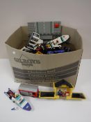 A box containing a large quantity of Lego