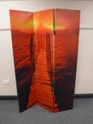 A three way folding room divider