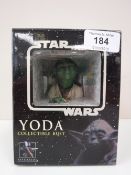 A boxed Gentle Giant Star Wars Yoda collectable bust
