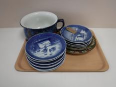 A tray containing a Cetem ware chamber pot, pattern number 889, Royal Copenhagen calendar plates,