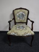 A tapestry upholstered armchair
