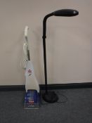 A Bissell Quick Wash carpet cleaner,
