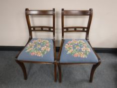 A pair of inlaid mahogany dining chairs