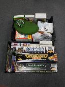 Two crates containing a quantity of Warhammer games magazines and figures