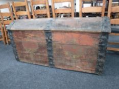 A 19th century pine metal bound domed topped shipping trunk