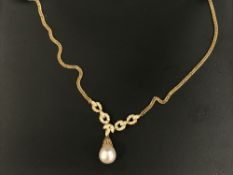 An 18ct gold pearl and diamond necklace