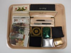 A tray of vintage postcards including hand stitched examples,