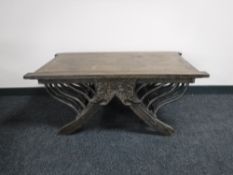 An Oriental hardwood coffee table