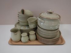 Two trays containing a quantity of Denby stoneware tea and dinnerware