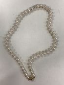 A fresh water pearl necklace with 9ct gold clasp