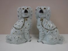 A pair of Staffordshire dogs