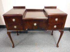 A Queen Anne style dressing table (no mirror), an oak chair,