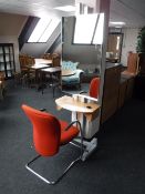 A mirrored hair dresser stand together with a chrome framed armchair upholstered in a red fabric
