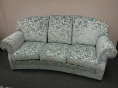A high quality Bridgewood three seater curved seater settee upholstered in a two tone fabric,